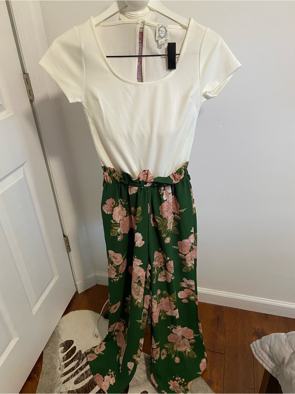Francesca’s Blue rain floral jumpsuit XS
